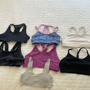 7 girls sports bras, 3 DSG, 3 Old navy, 1 Hanes, all sizes medium and small